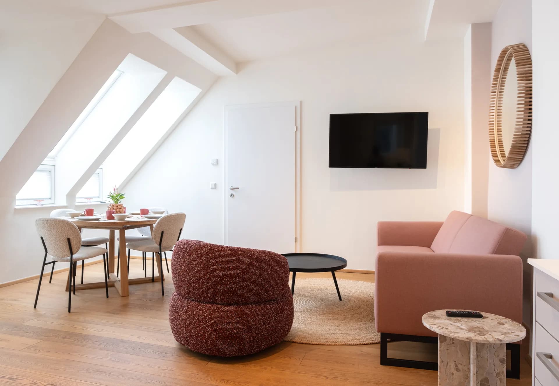 Double Mint with Balcony — bright living room with skylights