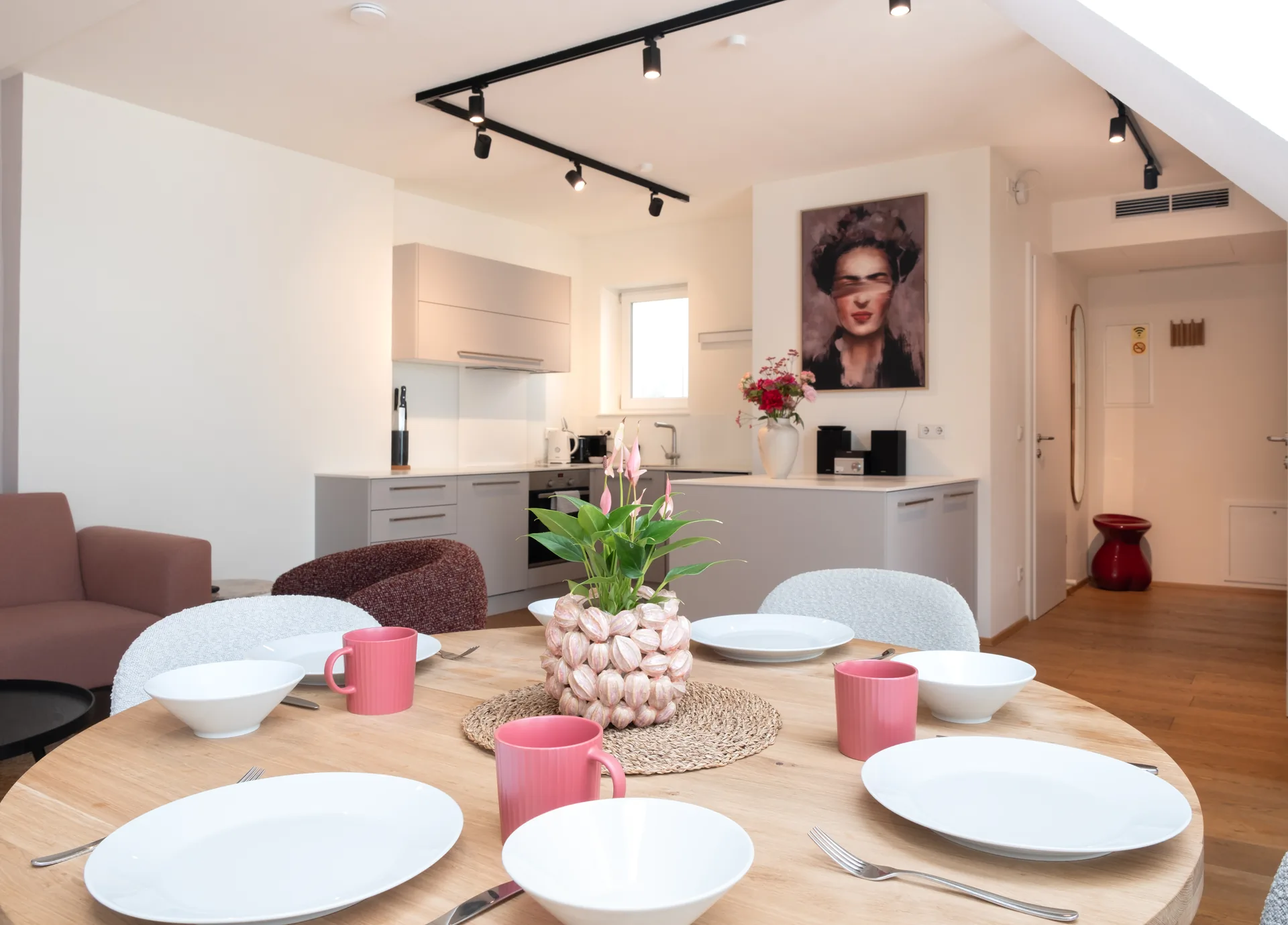 Double Mint Balcony — dining with Frida art and kitchen